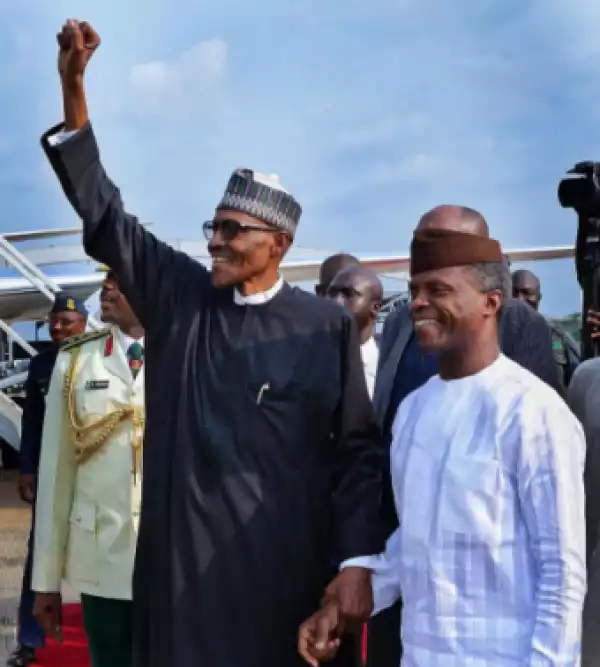 Anything Wrong with this Photo of President Buhari and VP Osinbajo in Abuja?
